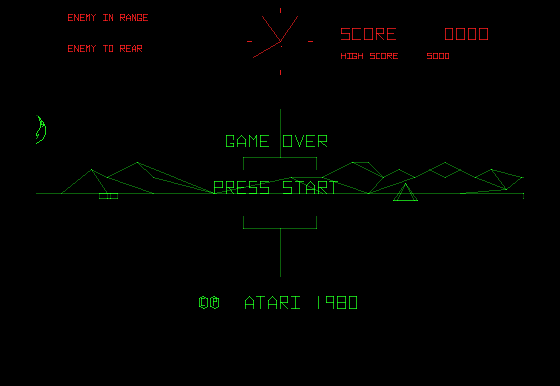 Battlezone attract mode: the green wireframe battlefield with horizon, obstacles and radar under the red overlay band