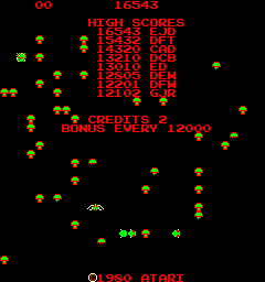 Centipede attract mode: the high-score table over a field of mushrooms with the centipede winding down, on the vertical monitor