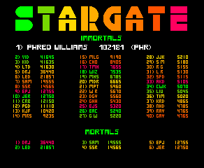 Stargate attract mode: the rainbow STARGATE logo over the Immortals table